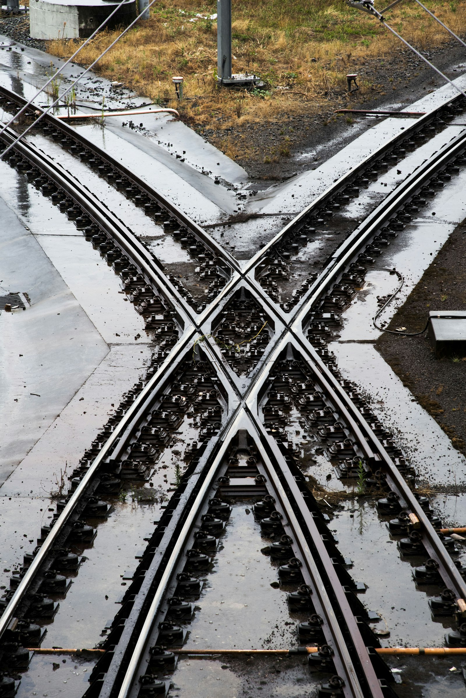Two railway tracks crossing at a junction
